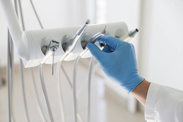 Professional Root Canal Treatment technician working in Hamilton Square, NJ
